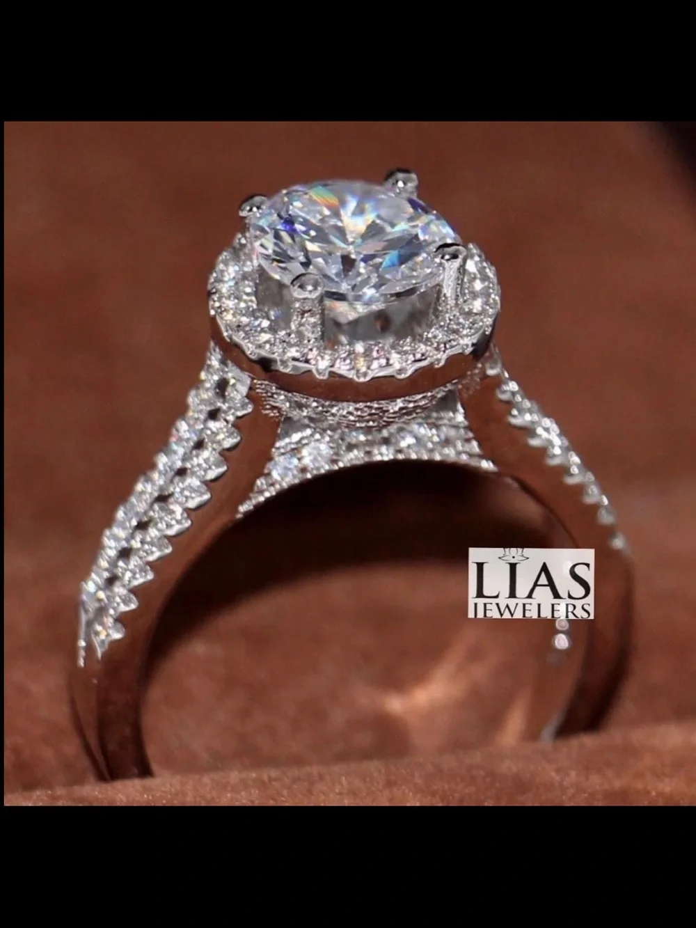 New 18k white gold engagement ring